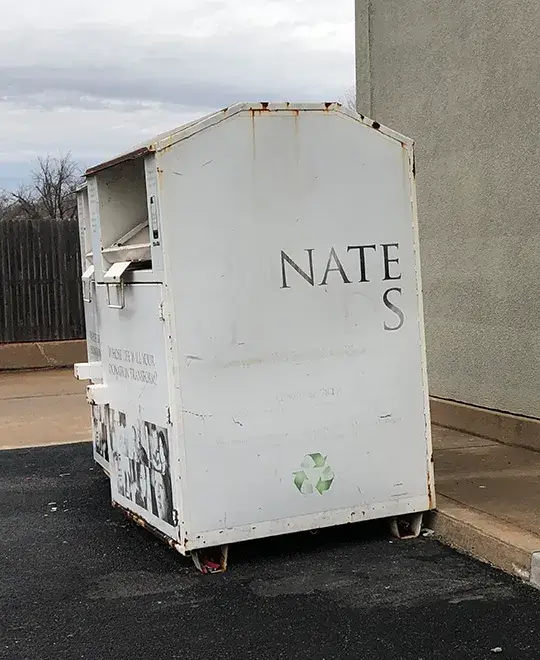 Donation bin with Nate S written on side