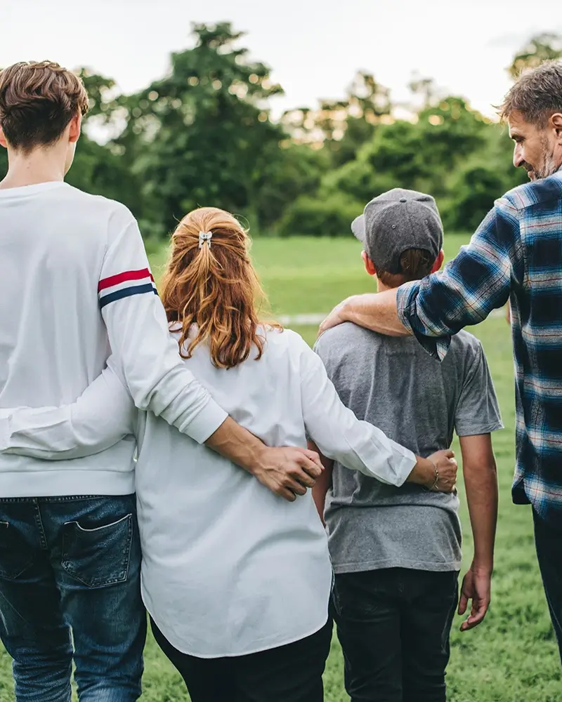 Family standing together outside